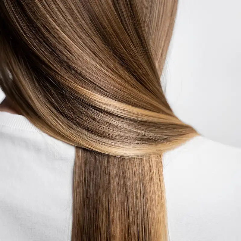 Smooth and shiny hair styled with Vividreamore Velo IntelliSense hair dryer, protected by precise heat control and negative ions for long-term health.