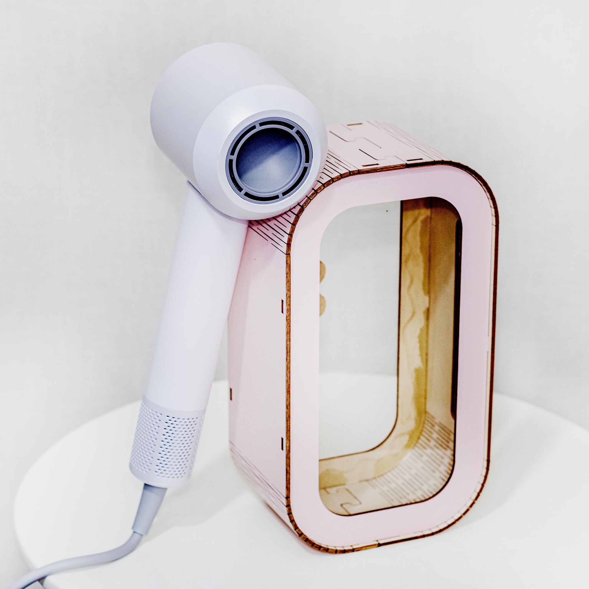 Vividreamore Velo Essential ionic hair dryer on table – compact travel-friendly design