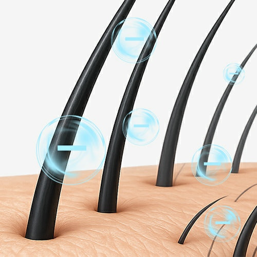 Vividreamore Velo Essential ionic hair dryer releasing millions of negative ions to reduce frizz, boost shine, and protect curly hair with comb or round brush attachment.